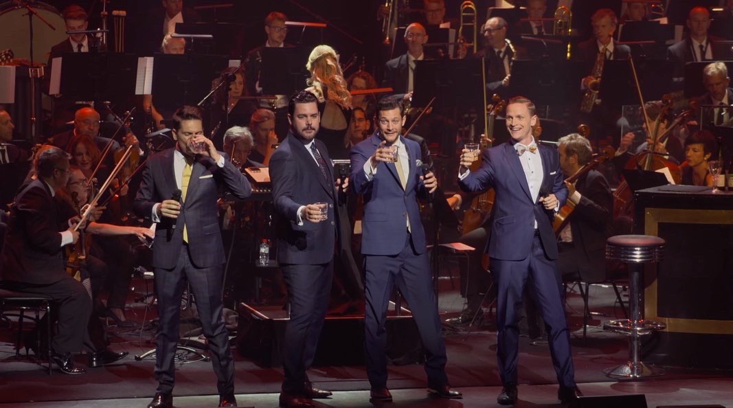 SwingOnThisAU's tweet photo. Relax, have a drink and enjoy this throwback to when #SwingOnThis joined @sydsymph at the majestic @SydOperaHouse. We know what you’re thinking - a recipe for way too much class. Yes, that’s correct. So, on the count of 1-2-3-4, who’d like to see our never-ever-released footage? https://t.co/6CZQFnAQ3K