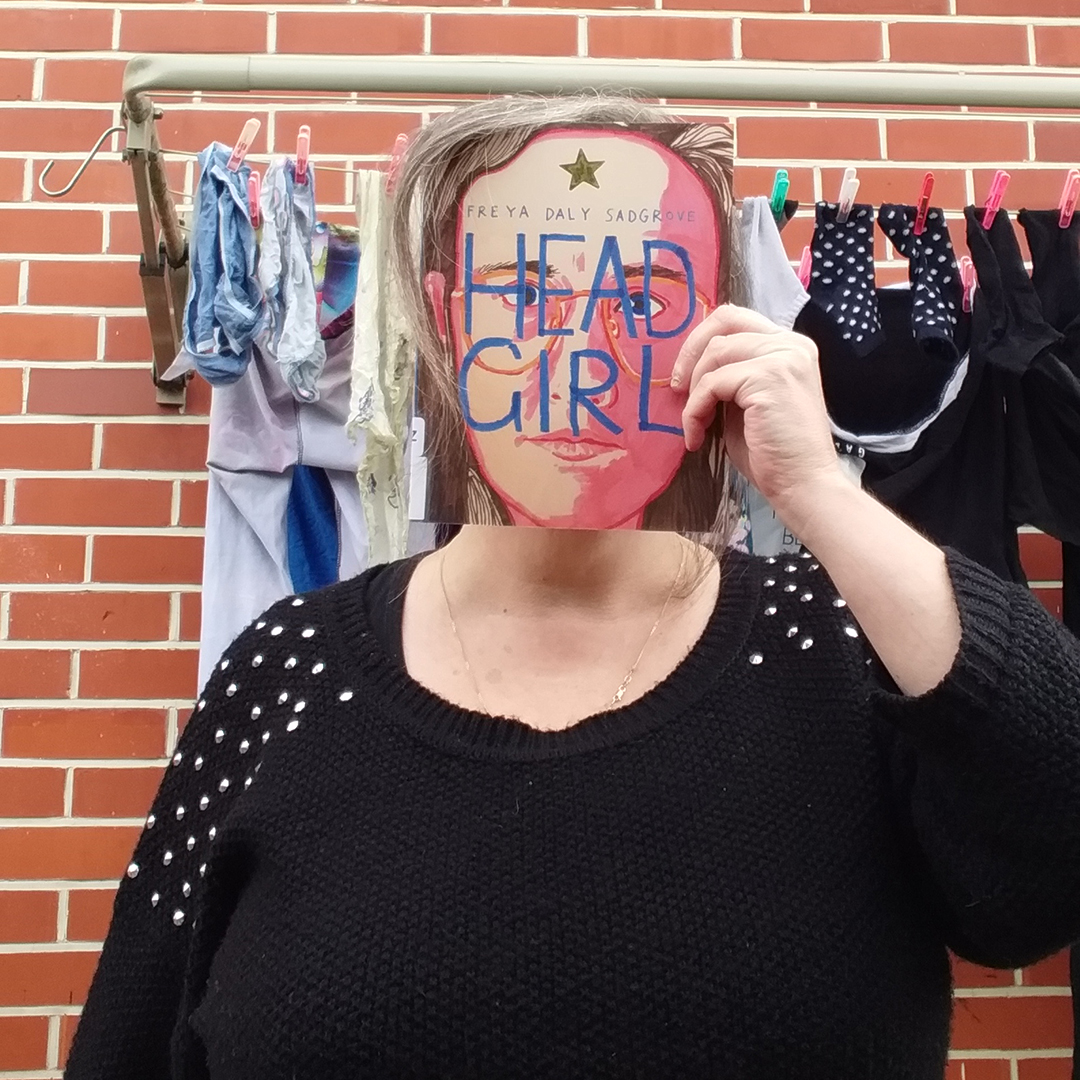 ChristchurchLib's tweet photo. Librarians do #bookface. I did @FreyaDalySad's book Head Girl, published by the inimitable @VUPBooks because it is BIG LOCKDOWN MOOD. 
More faces a la books here:
https://t.co/cHneDSyrIF #CCLFromHome #LibraryFromHome ^DR https://t.co/KksMJ0lZi8