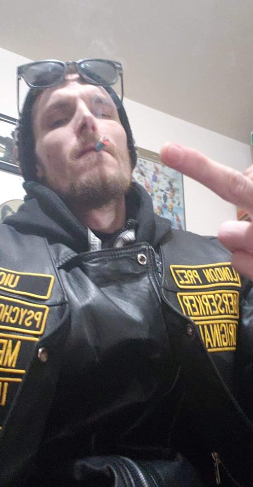 Meet Aaron Milonas (pictured here imitating an edgy 13 year old on school picture day), president of the London chapter of the Urban Infidels, a hate group styled on the Soldiers of Odin and wannabe weekend bikers. 1/14