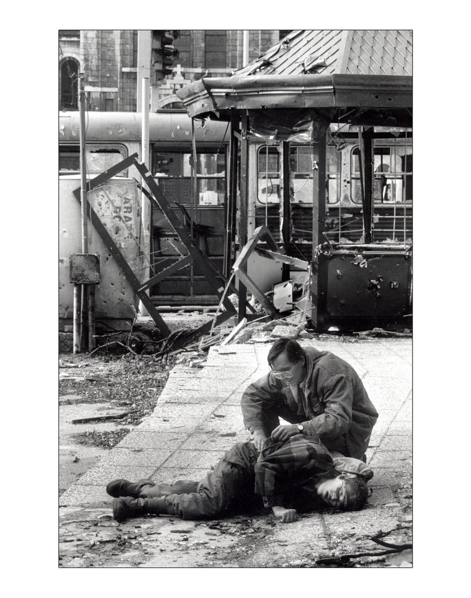 THE ACCURATE SHOT.The corpselies in the main Street, abandoned hours ago. Cars pass by a full speed. No ambulance has dared to go for him. They fear the snipers´shoot. The dog tags Will show his identity  @BosnianHistory