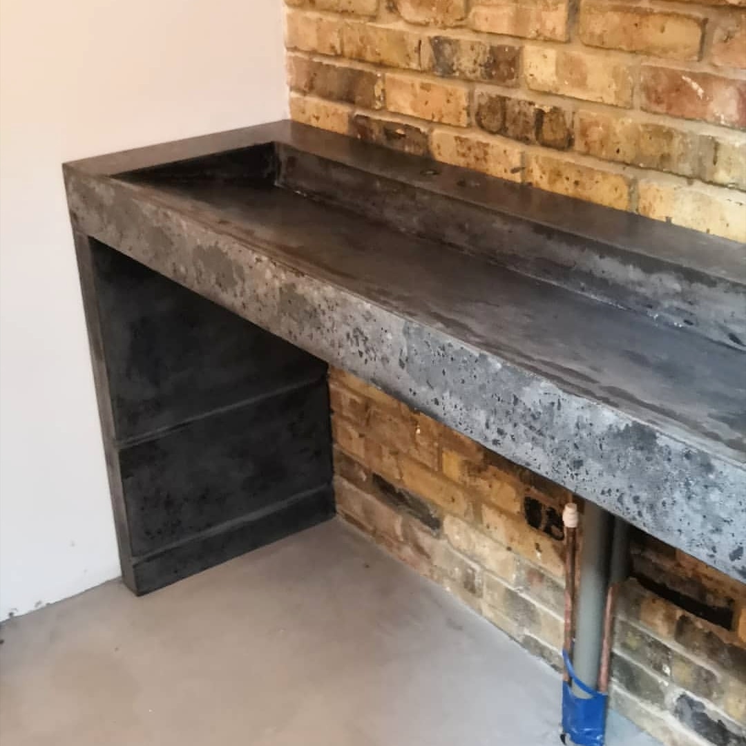 DesignNedev's tweet photo. Concrete ramp sink with a hidden waste. Heavy artificial pattern to achieve that industrial look.
.
.
.
#concretesink #concrete #concretedesign #bespokesink #designersink #architecture #concrete #concretefurniture #concretecountertops #bathroomdesign https://t.co/guxDYGLXab