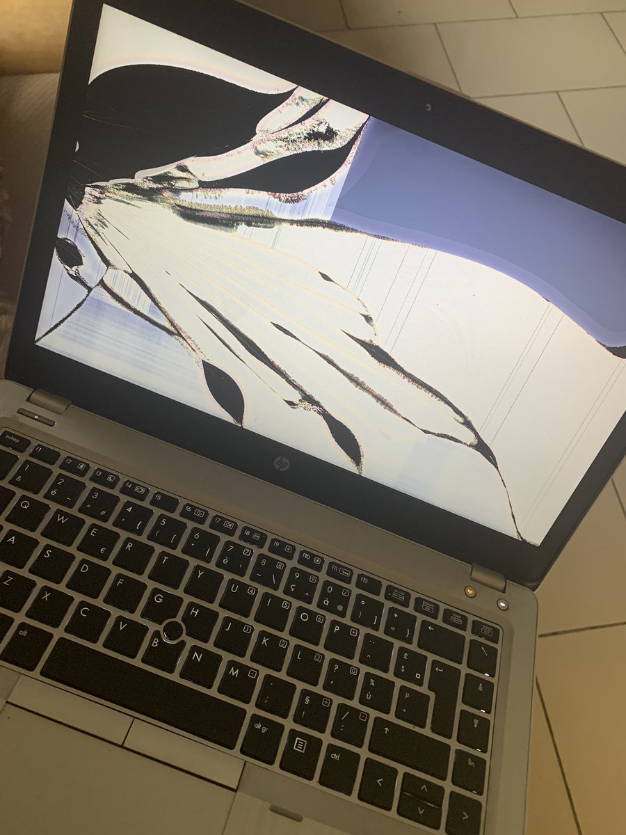 RealDreylo's tweet photo. I mistakenly kicked my laptop off the bed when I was sleeping 😭💔. Woke up to this https://t.co/xFlqyHVYU7