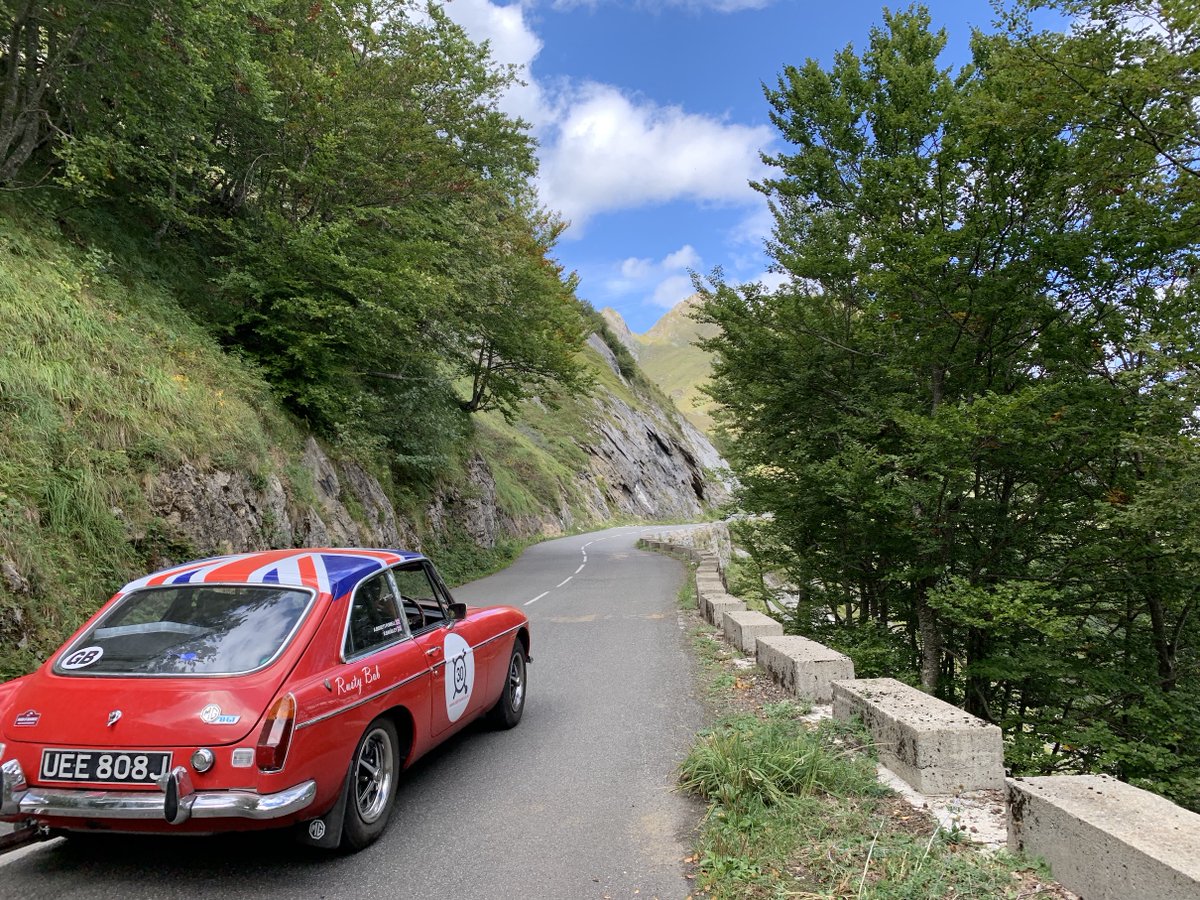 Rally_Round's tweet photo. Best of British! Love this MGB GT driving towards the blue skies on last year's Paris Biarritz Rally as it weaved its way through the Cols. 
#BackOnTheRoad #DrivingAdventures #ParisBiarritz #Rallying #MG #ClassicCar #ClassicCarRally #ThrowbackThursday #TBT https://t.co/NOUIjg64Yr