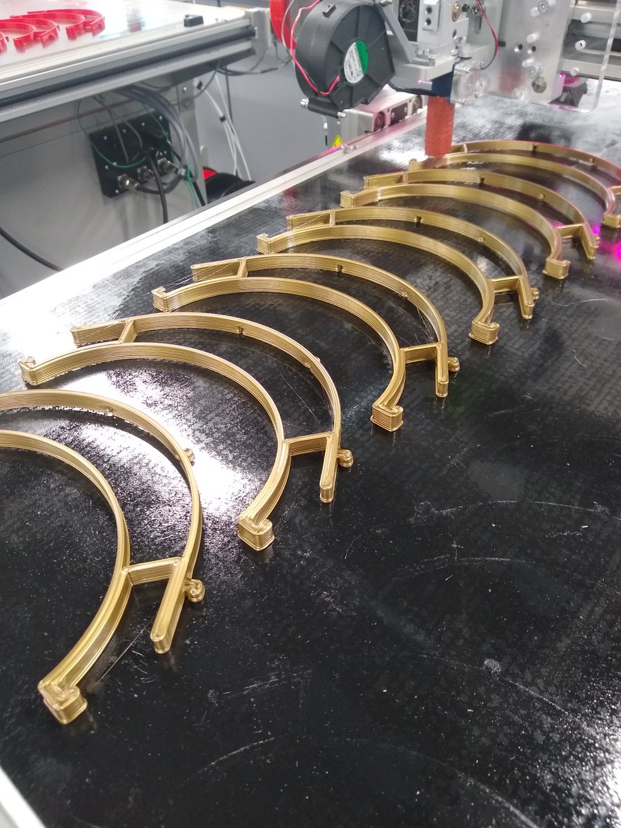 DrLizBish's tweet photo. Had some left over @3DFilaPrint #goldpla so using that up on the @3DPUnlimited to make some more face shields in @WEDesignMake today! #fastprinting #ppefornhs #phdlife #shiney https://t.co/4EQJ3ugJmg