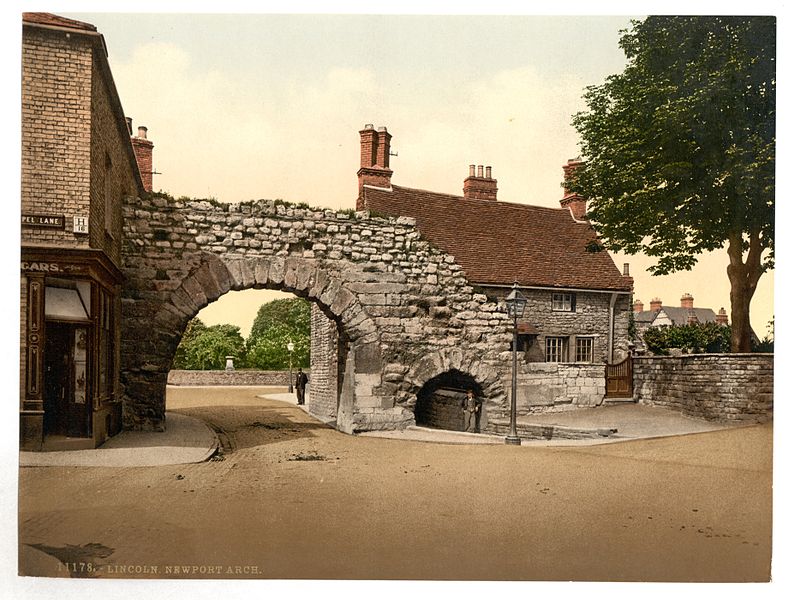 Built in the 3rd C, it formed the north gate of the upper city section of Lindum Colonia. Enlarged, and yes, much messed about with (it continued a Medieval city gate) those arches you see are Roman, and the center one is the oldest arch in the UK still used by road traffic!