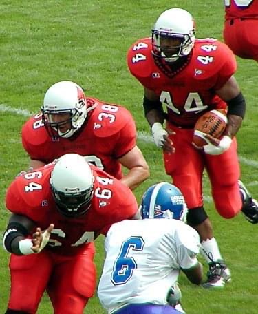 BallStateFB's tweet photo. It's #ThrowbackThursday‼️

Colin Johnson (@CoachJohnson64) was a 4-year letterwinner at BSU (1999-2002), highlighted by starting 3 years at Center and representing the Cards as a team captain during his senior season!

More about our very own OL Coach ➡️ https://t.co/imLSPRIjom https://t.co/bZD2sbwnPv