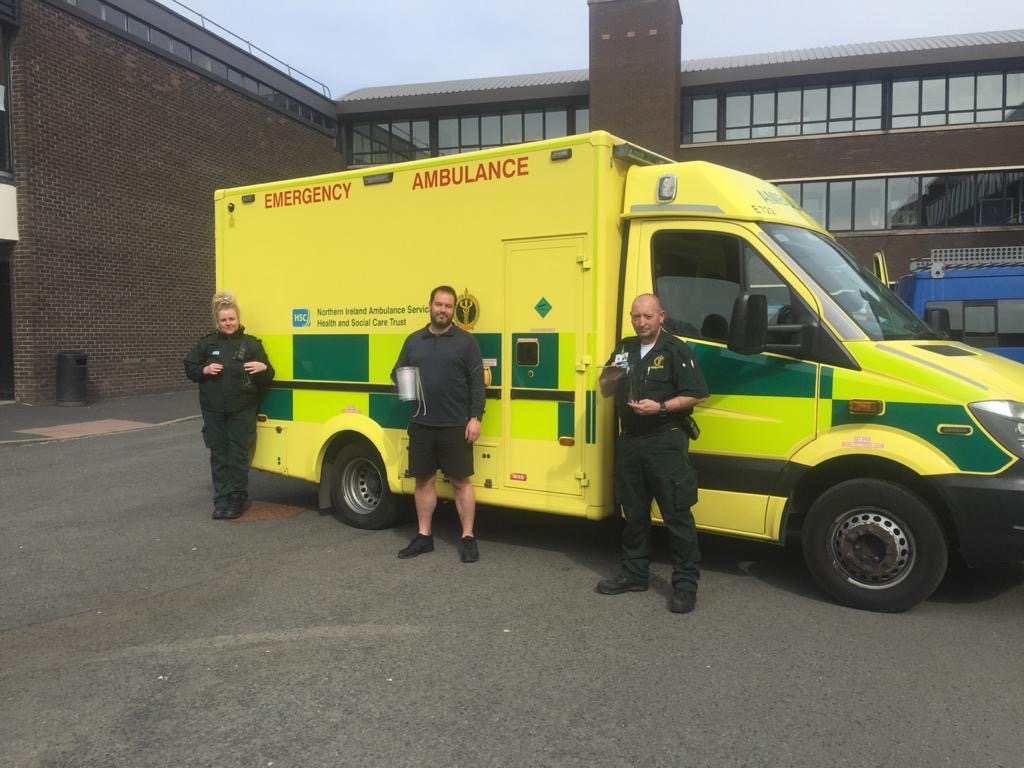 Some happy <a href="/nias999/">NIAS</a> staff picking up visors from Mr Monteith. #givingback #cantwaitfortheairambulancecollection