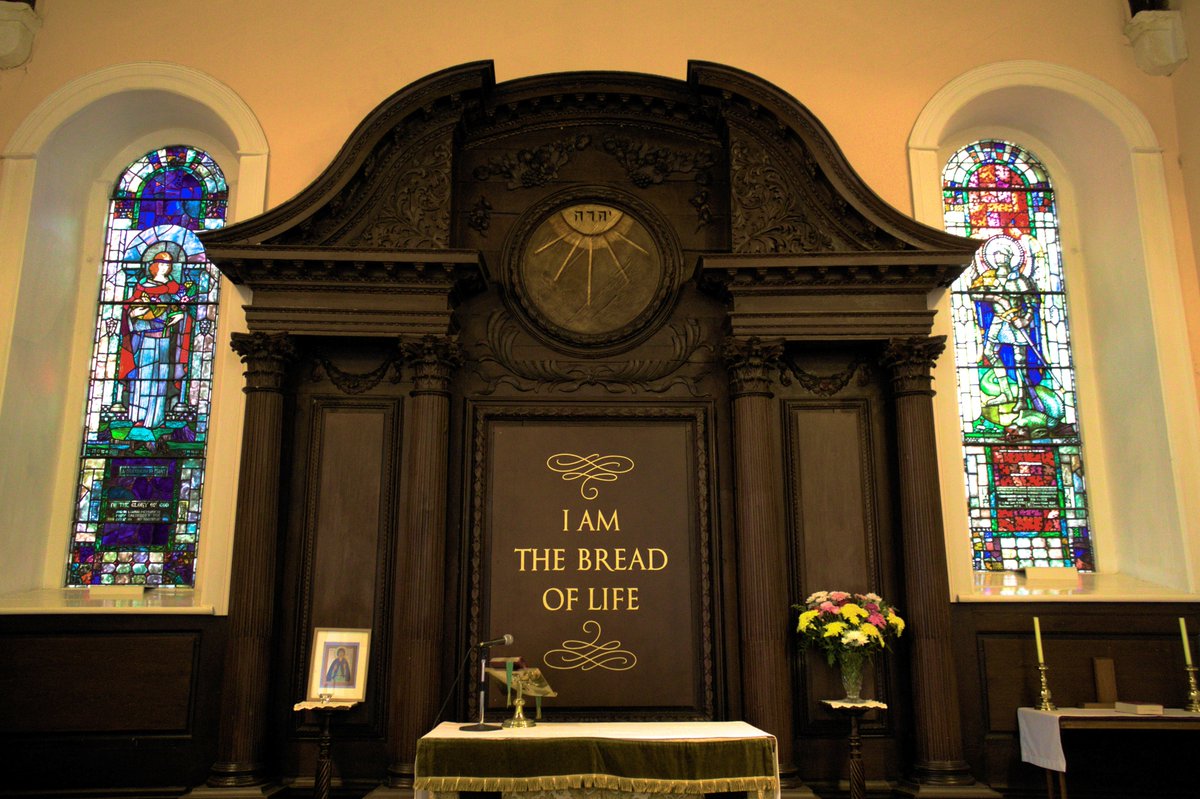 plain on the outside, the interior is beautiful & filled with historical relics & memorabilia. The carved altarpiece, at the back bears the Hebrew Name of God. The original inscription “This do in Remembrance of Me” was later changed to the present “I am the Bread of Life”. (3/7)