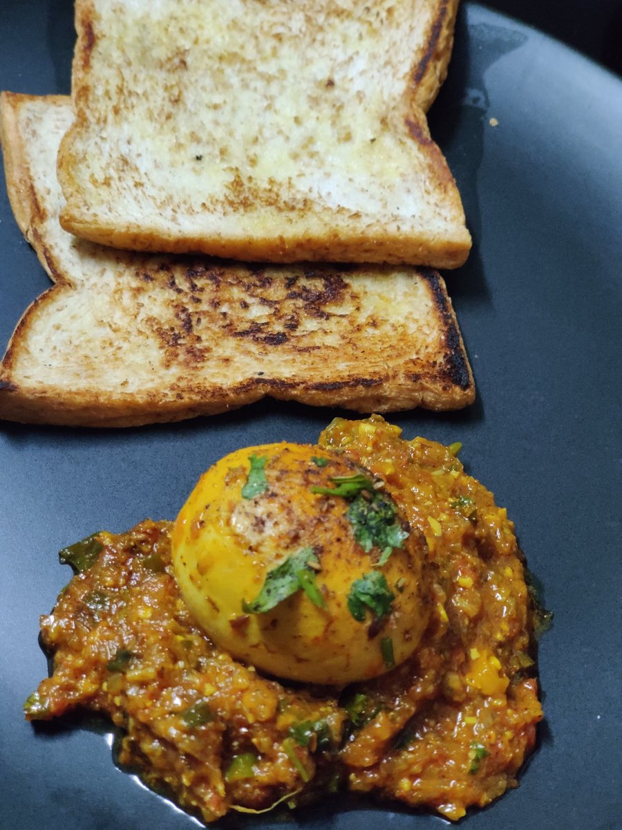 Dhaba style egg masala with bread...This one is prepared by my husband - a rare day off for me when he said he will cook...  #food  #cookingathome