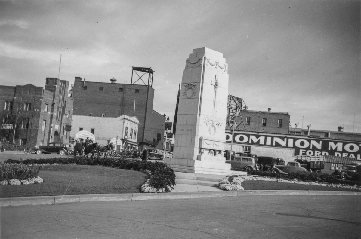 Apr9, 1938 • Looking north at Edmonton Cenotaph, originally unveiled two years earlier in 1936. The war memorial is now located in front of City Hall. Its original location, is now Veterans Park on 102nd street & 100 avenue. • PA PR1984.0028/0747