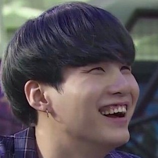 Yoobie Doobie's gummy smile, a thread to heal your soul.