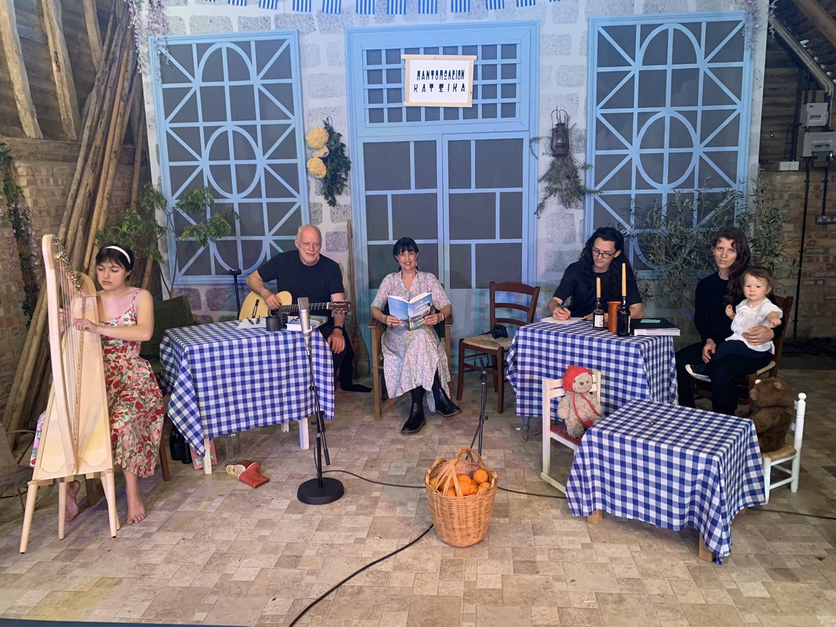 PollySamson's tweet photo. Two hours until @davidgilmour, the Von Trapped gang and me are back with our second #ATheatreForDreamers live stream (at the pretend Greek cafe in the shed at our house). Tune in at 8.30pm BST at https://t.co/TI18n9YE4x - after the applause for our incredible NHS. https://t.co/jMEzqkruWL