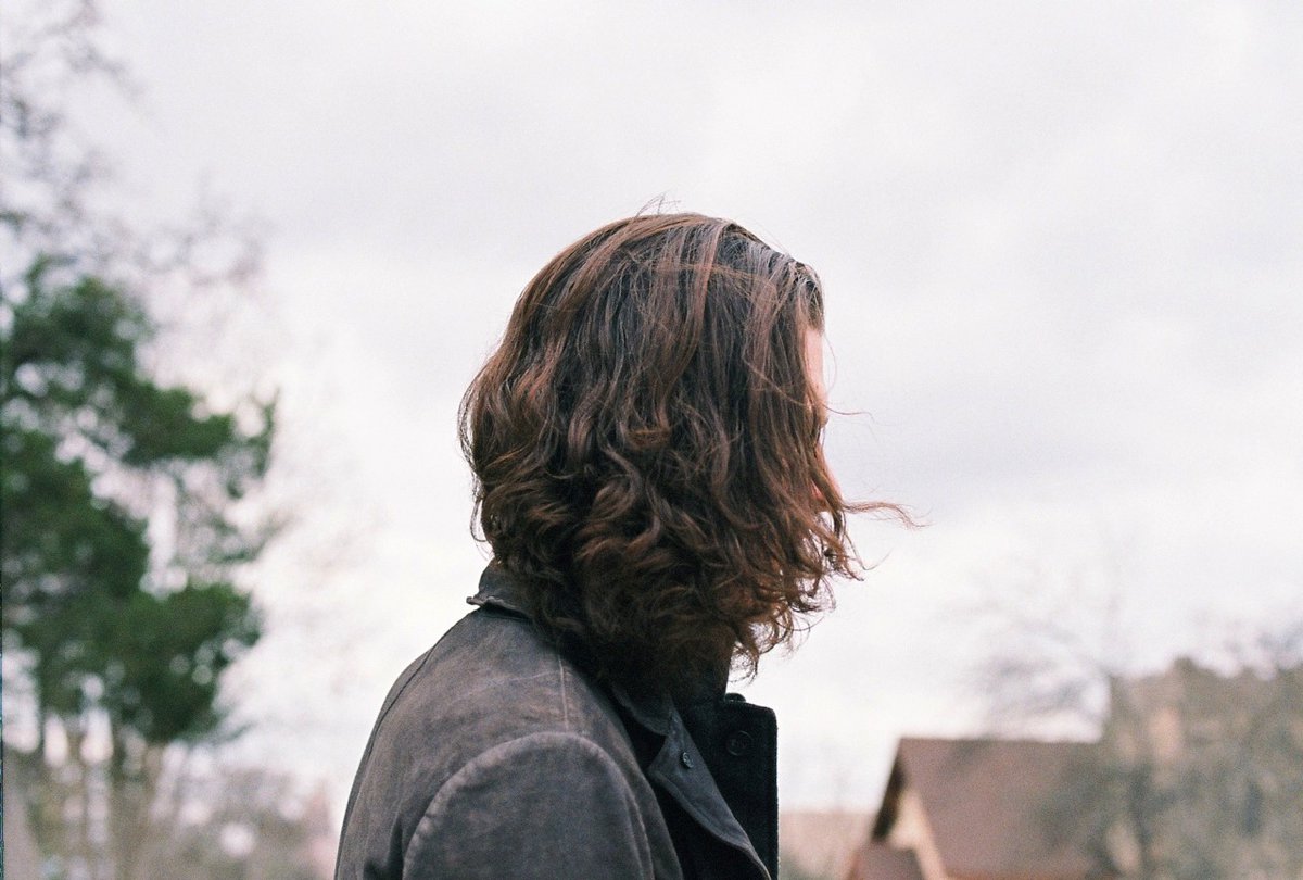 Only he would do a photoshoot at a cemetery!