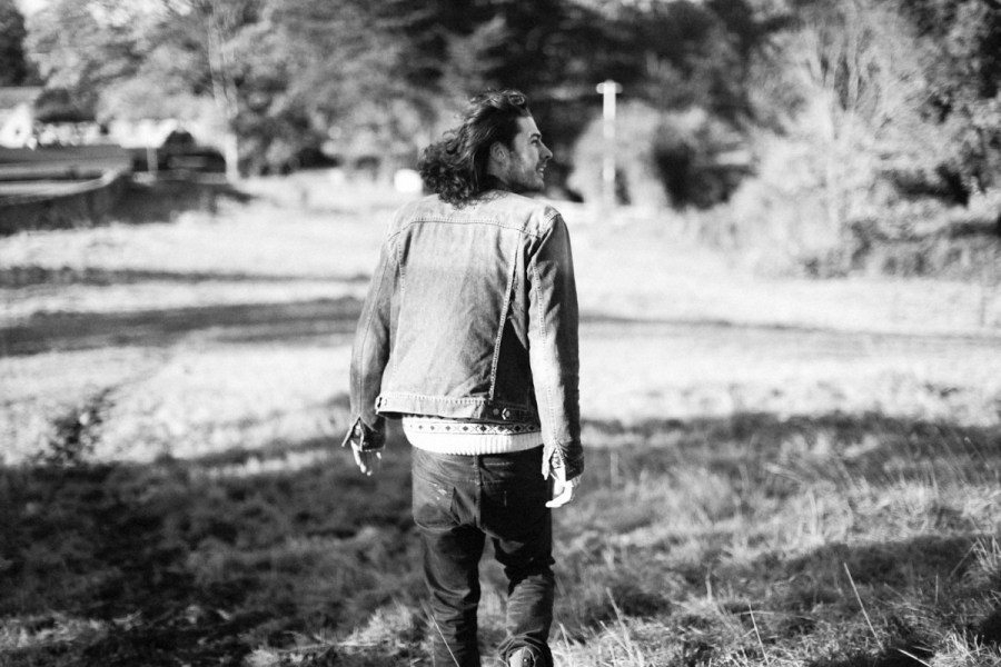 Only he would do a photoshoot at a cemetery!