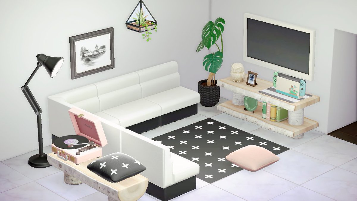 21. Un salon très moderne (Source :  https://www.reddit.com/r/AnimalCrossing/comments/fxnojh/quite_happy_with_how_my_living_room_turned_out/)