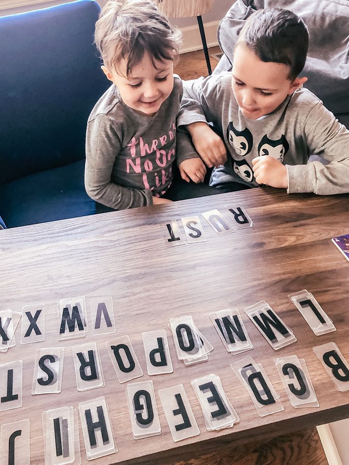 The best big brother, teaching Char how to sound out words.