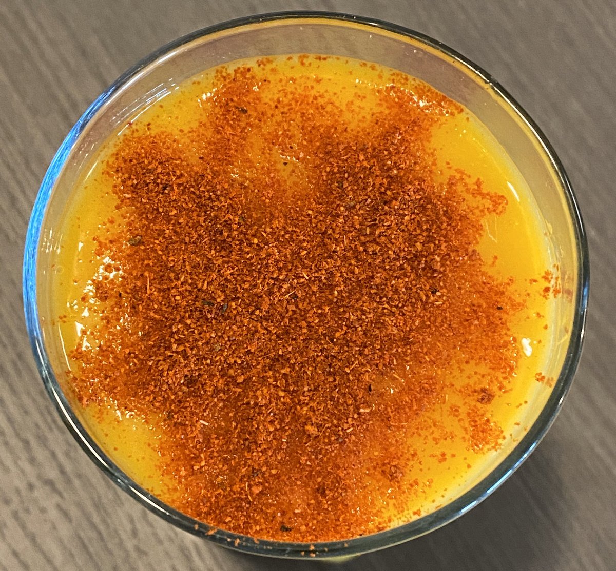 azcended's tweet photo. Frozen mangos blended with fresh ginger juice, and hand squeezed orange juice, topped with chili powder 🤤 https://t.co/I5J4E0hcKu