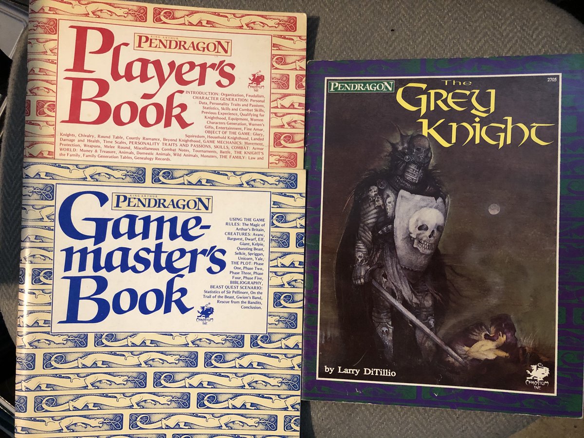 Pendragon is the RPG I love the most that I get to play the least. I picked up its 1st edition on release in 1985 (books at left, box maybe in MA). Arthurian mythos writ large with truly supportive mechanics. Grey Knight is an excellent adventure of that era.  #CuratedQuarantine.