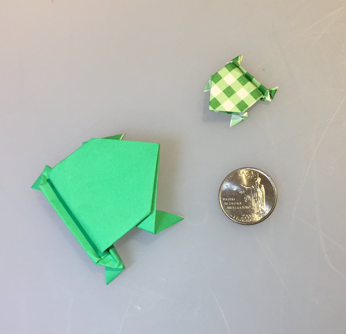 8. If you want to do what Ali did you’ll need to make the box from 15 cm x 15 cm paper and then make the frog from smaller paper. I used 7.5 cm x 7.5 cm kami. But you could make a frog with 15 cm x 15 cm paper and just use any larger container you have.