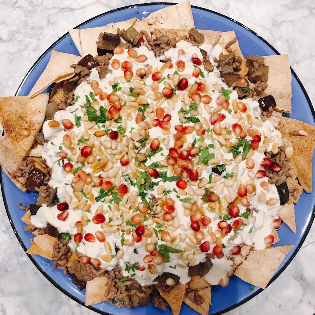 Day 7 of #NINEgella: Beef and Aubergine Fatteh. A great combination of flavours with every layer complementing the other perfectly. The flavours of this dish meld together to form perfect mouthfuls which are devoured quickly. Recipe: nigella.com/recipes/beef-a… <a href="/Nigella_Lawson/">Nigella Lawson</a>