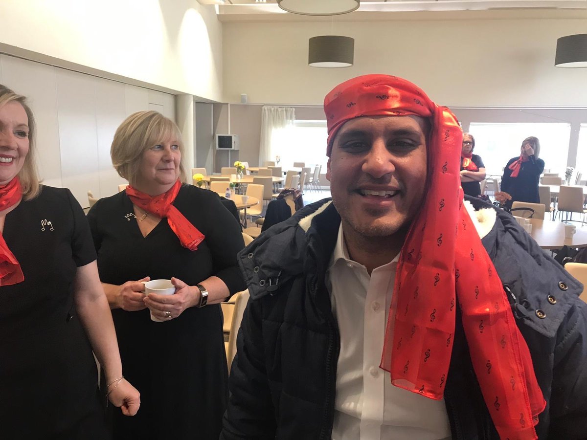 hnchoir's tweet photo. Need a smile? Here’s our super Doc @RobbieGhosal discovering a new way to wear the famous #HospitalNotes #choir red scarf! #WeAreBigKidsReally https://t.co/g7W2mPMYpY