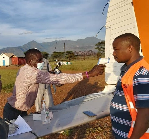 MAAIF_Uganda's tweet photo. @GeoffreyOtim1 @fobita @awanyoto @MosesOdokonyero @PSAgriculture And the #UGLocustControl teams in this fight are doing that. Observing the #COVID19UG prevention guidelines as provided by Government, including testing whoever enters the airport area and observing #SocialDistancing at all times. https://t.co/mvbfMK9gso