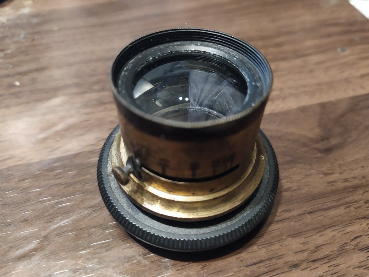 Thornton Pickard Amber lens (1890). A generation newer and the wheel aperture is replaced by the more modern type. Still a lot fewer pieces of glass than a modern lens.  #photography