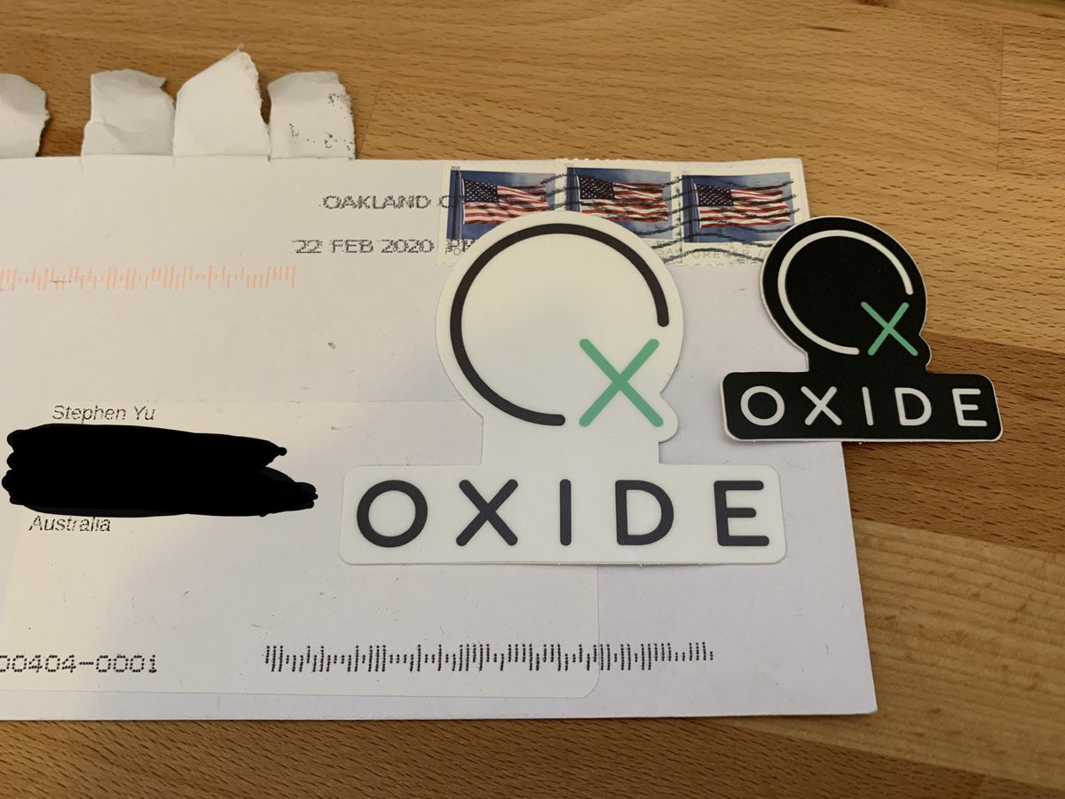 stephenyu's tweet photo. Finally made my way into the office today after weeks of self-isolation and I was surprised to find my @oxidecomputer stickers, from Oakland to Sydney! That’s a lot of stamps 🙇Thank you @jessfraz! https://t.co/7zQRNsGS3Y