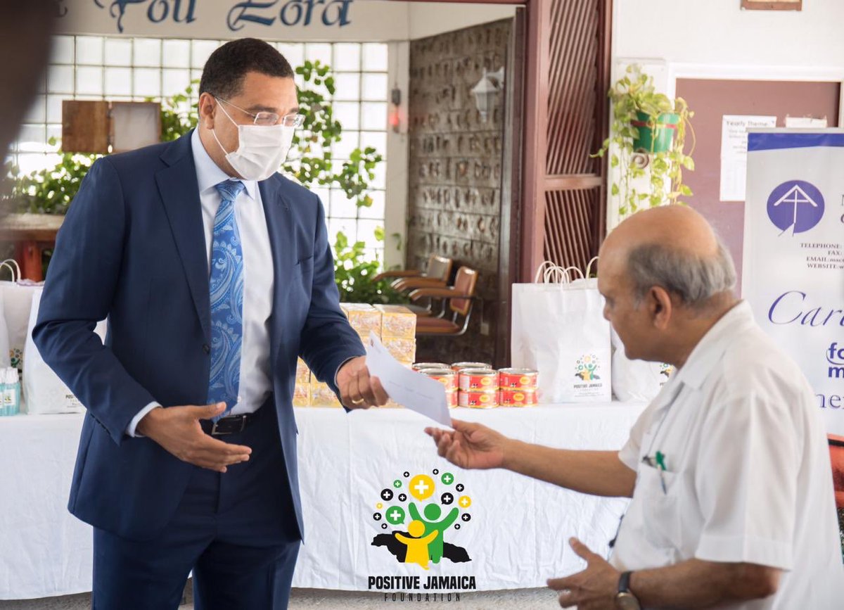 PositiveJamaic1's tweet photo. Our Chairman @AndrewHolnessJM presented a cheque,  essential supplies and Easter season treats to Monsignor Ramkisoon of the Mustard Seed Communities, today. Covid-19 has affected everyone including the charitable community, and where possible let us offer help. https://t.co/65UNTzfEIZ