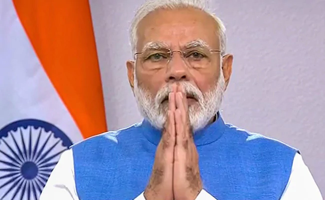 ndtv's tweet photo. PM Modi likely to address nation to announce whether #CoronavirusLockdown ends Tuesday https://t.co/YRQ8OY20Is https://t.co/0fOTeYd562
