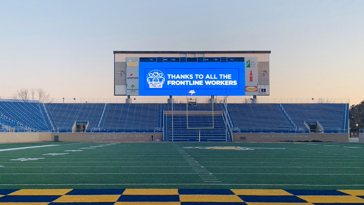 GoJacksSDSU's tweet photo. Dana J. Dykhouse Stadium is joining a global initiative to show support and gratitude to the health care professionals and essential workers fighting on the front lines against #COVID19. 

To all those fighting on the front lines, thank you. 💙

#LightItBlue #GoJacks https://t.co/SRHxPPVPv0