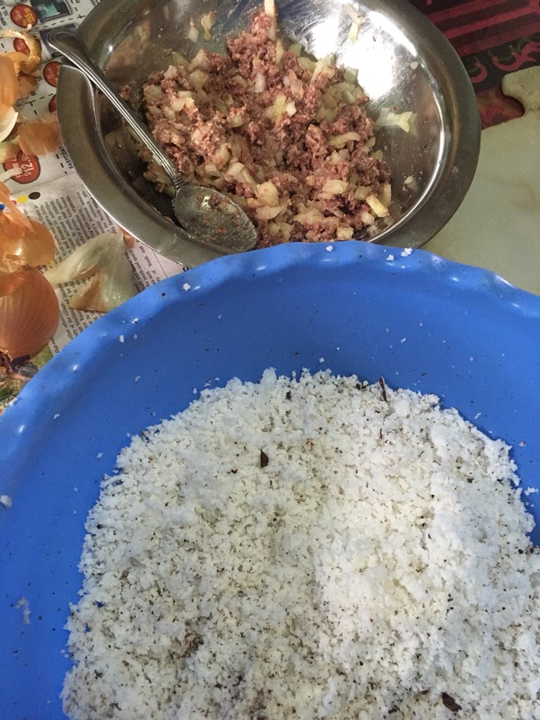 So lunch preps for today .. Vinaka  @tu_fili Na kari niu after 102 Years 1. Cut onions into small blocks and mix it with tin meat 2. Mix it mix it 3. Grated coconut to make it true 4. Cook your rourou (taro leaves) ... 