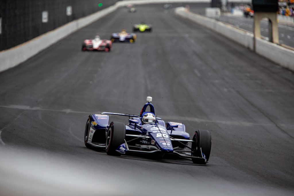 At this point, the race is about a third over. Do I know who’s winning? Not really. It’s different than watching as a fan. I’m more concerned with getting coverage of the cars in situations unique to race day in case one of them wins. Also trying to take photos of fans.