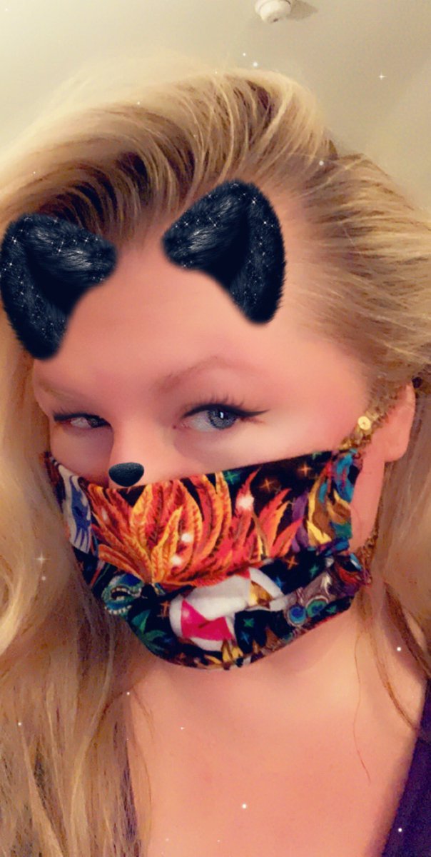 This mask I made a few days ago gives far more coverage, obviously, and can be worn out.  I even sewed a pocket for a filter.  The fringe one is just for fun because I liked the little Flapper Girl dress I made for my friend's one year old baby last Halloween!  😂 🤩😍