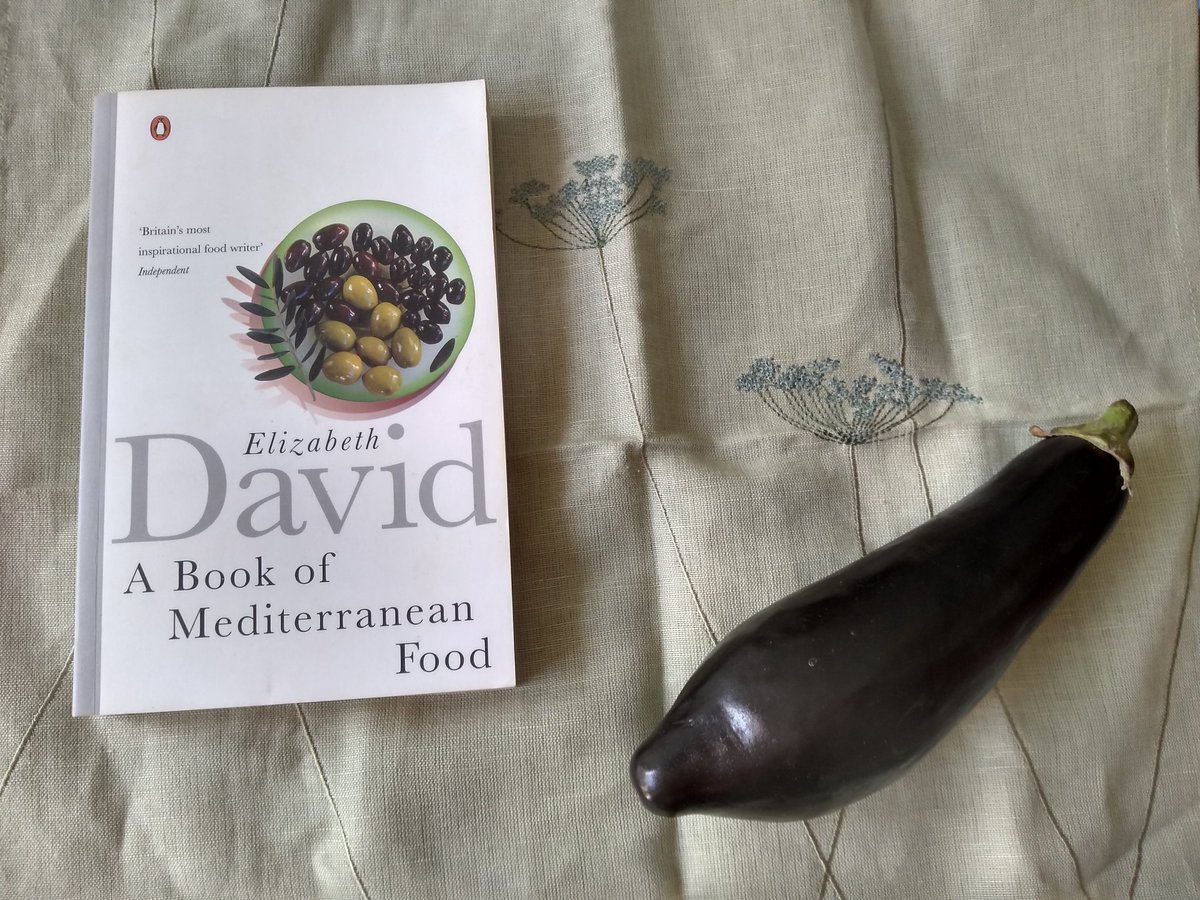 The Penguin Archives with handbooks. Elizabeth David was cross about the wrinkled aubergine on the cover of her book, and the recipe book I left home with a thread