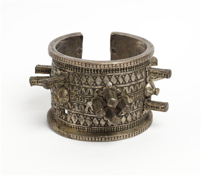 (1/2) 19th century silver Algerian bracelet, donated to the V&A Museum by J. B. Clarke-Thornhill. The note with it reads "Bought from an Ouled Naїl girl in a brothel at Bou Saada. Made at Biskra, Algeria. These ladies are often attacked & sometimes murdered for the sake of ...