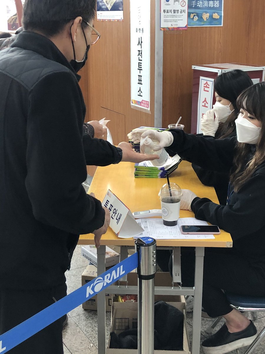 BBCLBicker's tweet photo. Voters at the polls during a pandemic. Most told us they had few worries as they cast their ballot and were happy with the measures. Voters queue 1 m apart, have temperature taken, wear a mask and plastic gloves, cast their ballot, ballot booth is disinfected. Done! https://t.co/4d0IM67PSR