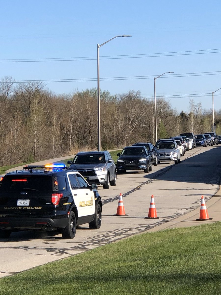 JOCOHealth's tweet photo. Ready to start testing Johnson County residents for COVID-19 at our first drive thru clinic. Thank you to the @OlathePolice for helping direct traffic this morning. https://t.co/gyvBJydJKX