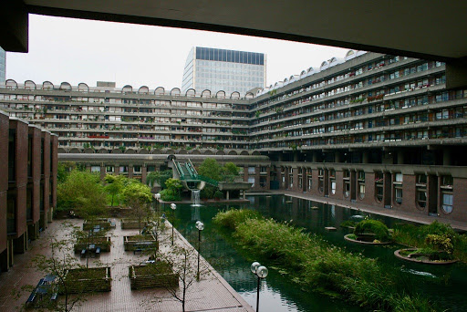 It gets tarred by association w/ soviet gov't buildings (b/c it also has the advantage of being cheap and easy to build in post-war Europe), but it doesn't have to be grim or sterile.Just... plant some fucking plants. Make it a space worth living in.(Barbican Center, London)