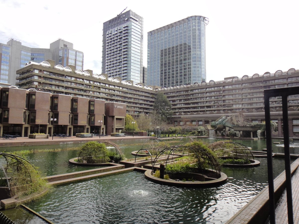It gets tarred by association w/ soviet gov't buildings (b/c it also has the advantage of being cheap and easy to build in post-war Europe), but it doesn't have to be grim or sterile.Just... plant some fucking plants. Make it a space worth living in.(Barbican Center, London)