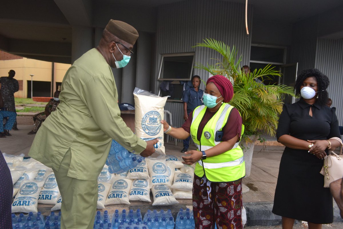 SSA on Baundary Matters, Deputy Governor's office, Mrs Khadijat Hammed, receiving the products on behalf of the Deputy Governor.