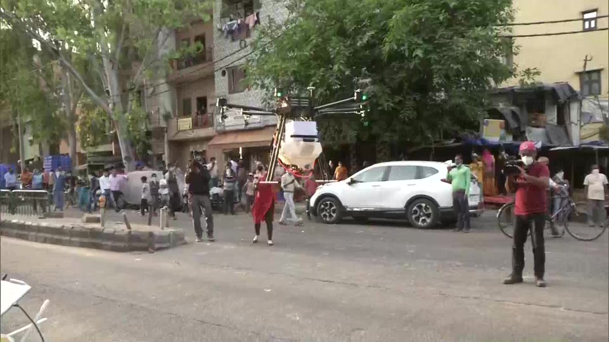 ANI's tweet photo. Delhi: Drones being used to spray disinfectants in Majnu-ka-tilla area, in wake of #coronavirus outbreak. https://t.co/1ZWA9psGE2