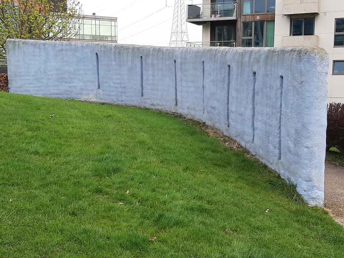 When the Park West Pointe apartments were being built, some skeletal remains were uncovered, they reckon there was an Early Christian burial site here. This could mark the top of a burial mound or it could be just a random hilly bit with some wall on top of it.