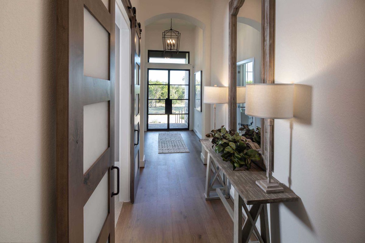 Your entryway is an opportunity to make a big statement in a relatively humble space! #HighlandHomesTX View More: bit.ly/2X4JpR0