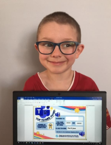 BroBanw's tweet photo. Two pupils proudly showing off the certificates they received for handing in some excellent work through Teams! Well done boys 🌈🌈 @HwbNews @ErwCymru https://t.co/iJF4LmBDdr