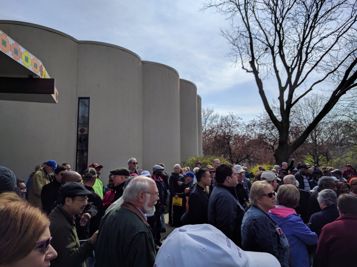 It was a 1 block walk to St Benedict. Expected to see tour buses carrying loads of marchers for the walk, but there were none. Arrived to find overwhelmingly middle-aged white crowd loitering.