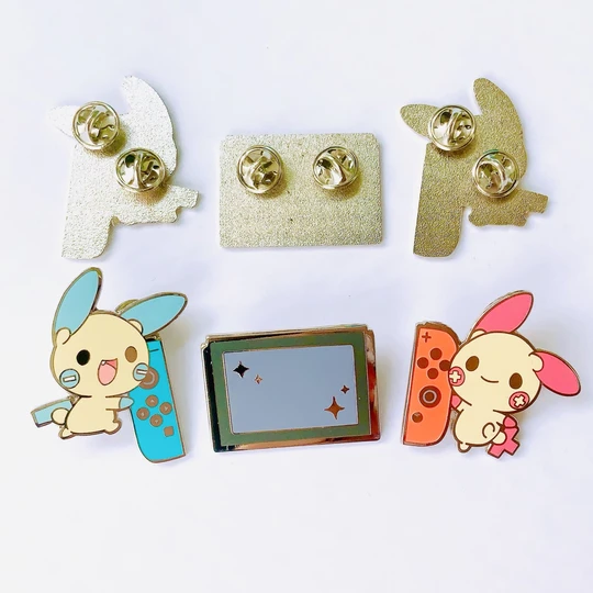 Bonus is this switch one for being so playful. There's SO MUCH you can do with this as an accessory, thank you for having FUN. https://toasterkiwi.shop/collections/pins/products/nintendo-switch-plusle-minun-enamel-pin-1-5