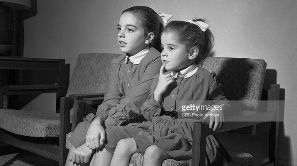 So a network showing a major Hollywood feature, uncut and in color, was a very big deal in 1956. A few days before the broadcast, CBS staged a photo op with Garland's daughters, Liza Minnelli and Lorna Luft, who watched the film on a monitor.  #TCMParty