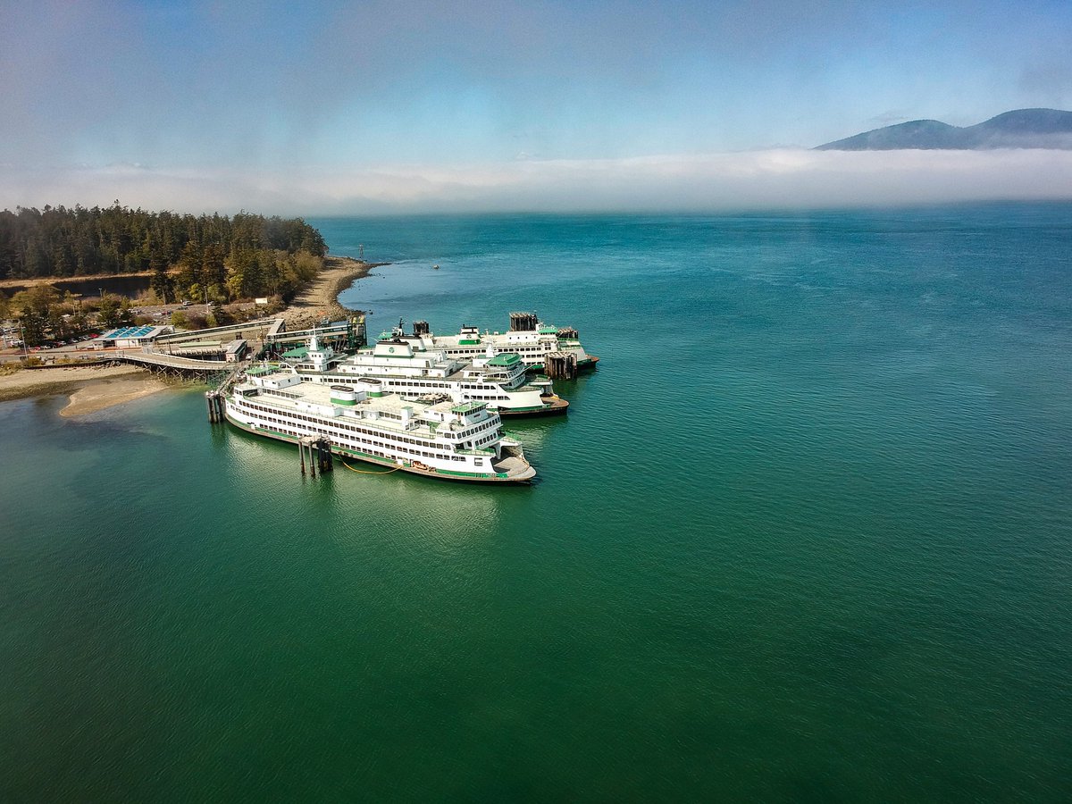PKProductionsWA's tweet photo. Three Washington State Ferries sit at the Anacortes Ferry Terminal awaiting departure. Turning into a gorgeous day to be on the water! https://t.co/oZSjAjXpqG