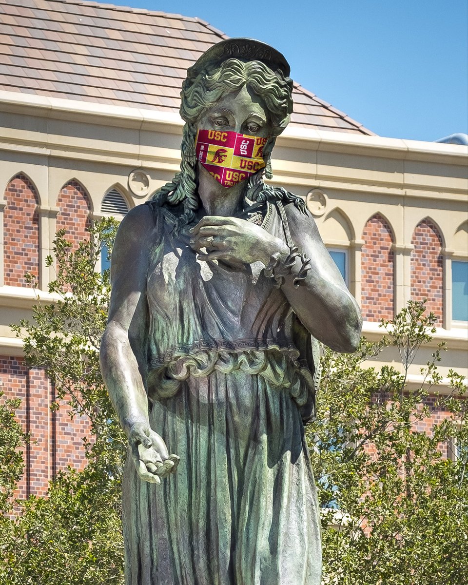 Hecuba wearing a mask